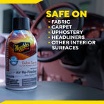 Meguiar's Dubai Sands aerosol can on a car surface with bold text listing surfaces it's safe on