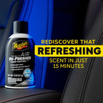 Meguiar's Air Re-Fresher can positioned on a car armrest with promotional text 'Rediscover That Refreshing Scent in Just 15 Minutes'.