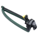 Green and black Melnor oscillating lawn sprinkler head on white background with hose connector