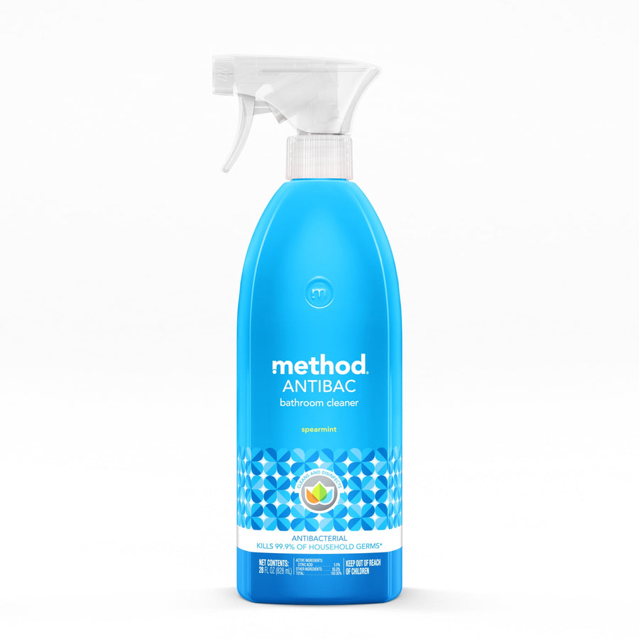 Bright blue Method Antibac spearmint bathroom cleaner spray bottle with white trigger on a white background