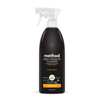 Method Daily Granite Cleaner spray bottle in dark label with orange tangerine scent badge on a white background.