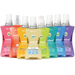 Row of Method laundry detergent bottles in assorted colors representing multiple scents, shown front-on as a product lineup.