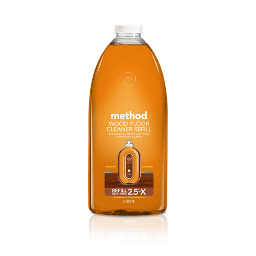 Clear amber Method wood floor cleaner refill bottle labeled almond with front-facing product label on white background