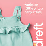 Mint-green baby dress on pink background with text 'works on 100% of top baby stains' and Dreft logo