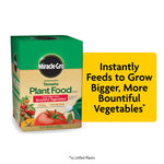 Boxed Miracle-Gro water soluble tomato plant food with tomato imagery and bold brand logo on green and tan packaging