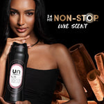 Model holding a black Unstopables N.15 bottle against a dark backdrop with cinnamon imagery and "24 hr Non-Stop" text