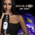 Model holding a black Unstopables N.37 bottle with purple flowers and '24 HR Non-Stop Luxe Scent' text beside her.