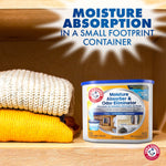 Arm & Hammer Moisture Absorber tub placed on a shelf next to folded knit garments with text about small footprint container