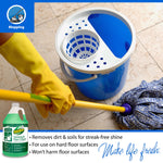 Mopping scene with gloved hand, mop, blue wringer bucket and small OdoBan Neutral pH floor cleaner bottle inset with benefit text