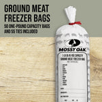 Rolled Mossy Oak ground meat freezer bag tied with a red twist tie pictured on a wood surface with product text overlay.