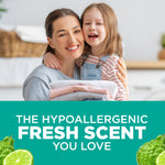 Smiling woman and child holding folded laundry above green panel reading 'The hypoallergenic fresh scent you love'