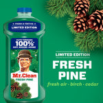 Mr. Clean Fresh Pine bottle against a green background with pine branches and text announcing limited edition fresh pine scent