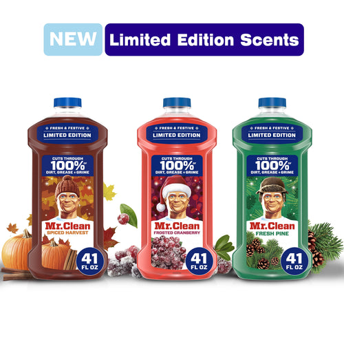 Three Mr. Clean limited edition all-purpose cleaner bottles in spiced harvest, frosted cranberry, and fresh pine with seasonal accents