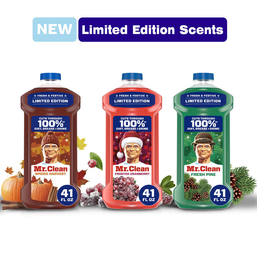 Three Mr. Clean limited edition all-purpose cleaner bottles in spiced harvest, frosted cranberry, and fresh pine with seasonal accents