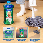 Mr. Clean Meadows & Rain bottle on a floor next to a mop and a person's socked feet in a lifestyle cleaning scene