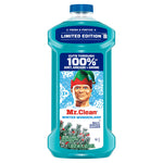 Studio shot of teal Mr. Clean Winter Wonderland multi-surface cleaner bottle on white background showing limited edition label