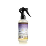 Rear view of Mrs. Meyer’s Clean Day Compassion Flower room freshener bottle showing back label and black trigger
