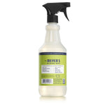 Rear view of Mrs. Meyer's Clean Day spray bottle showing label back and black trigger nozzle on white background