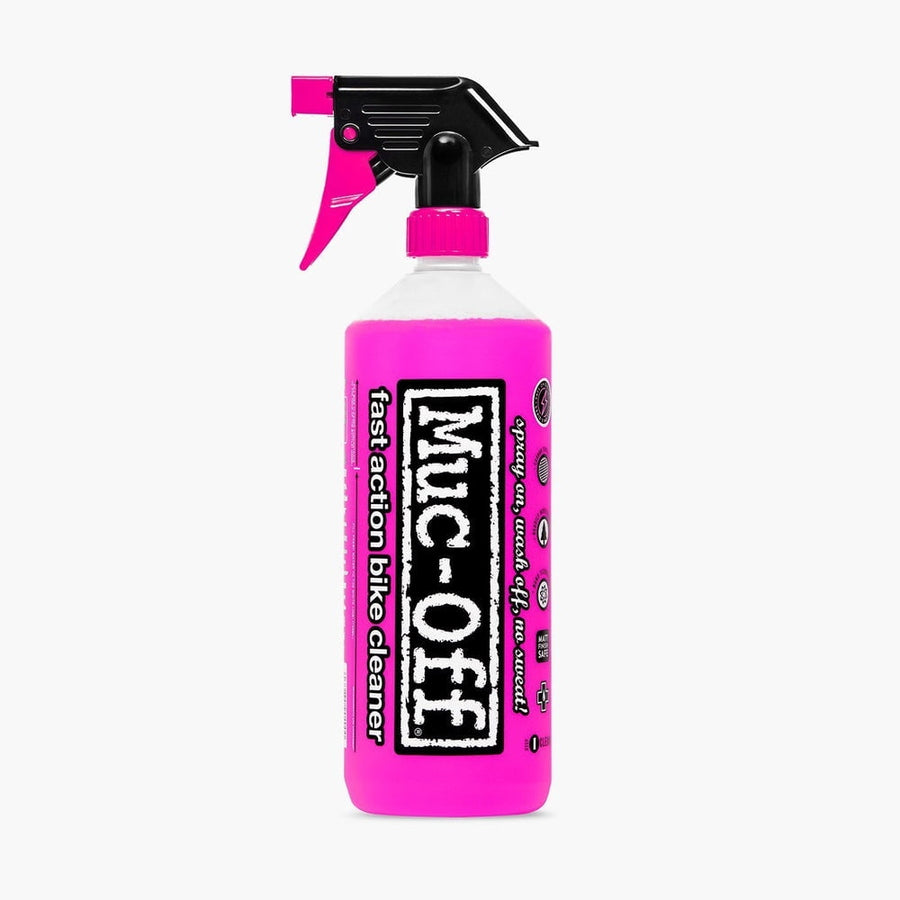 Bright pink Muc-Off spray bottle labeled “fast action bike cleaner” with black trigger top on white background