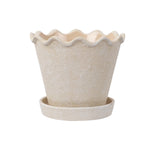 My Texas House cream ceramic planter with wavy rim and matching saucer on white background