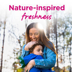 Outdoor lifestyle image of a smiling woman hugging a child beneath headline 'Nature-inspired freshness'