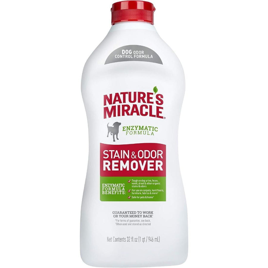 White Nature's Miracle bottle with red cap labeled Stain & Odor Remover for dog messes, front product shot on white background.
