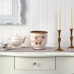 Nearly Natural floral Tuscan ceramic planter styled on a shelf with teapot and candlesticks in vignette