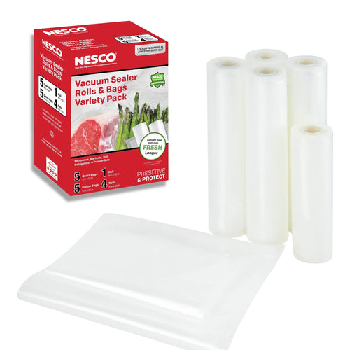 Boxed NESCO vacuum sealer rolls and bags variety pack with several clear vacuum roll cylinders and a flat sealed bag displayed