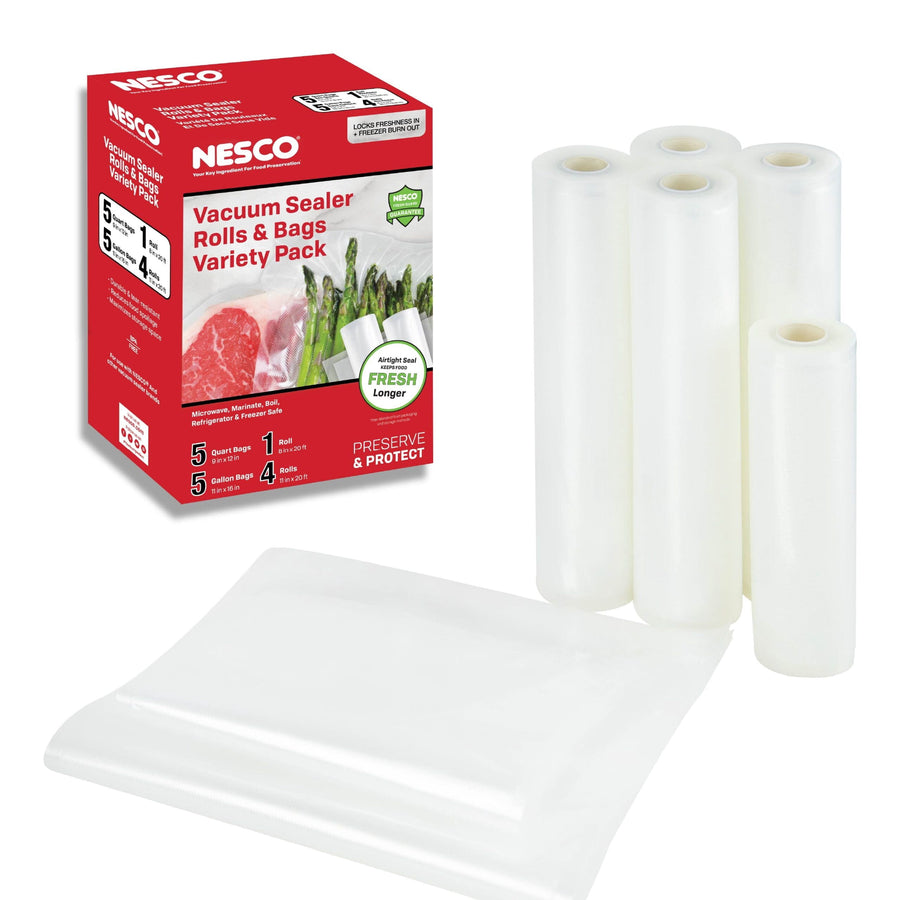 Boxed NESCO vacuum sealer rolls and bags variety pack with several clear vacuum roll cylinders and a flat sealed bag displayed