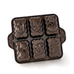 Nordic Ware harvest-themed mini loaf pan with six detailed cavity designs including turkey, leaf and pumpkin