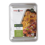 Nordic Ware Naturals 9x13 aluminum pan shown with branded packaging insert displaying product imagery