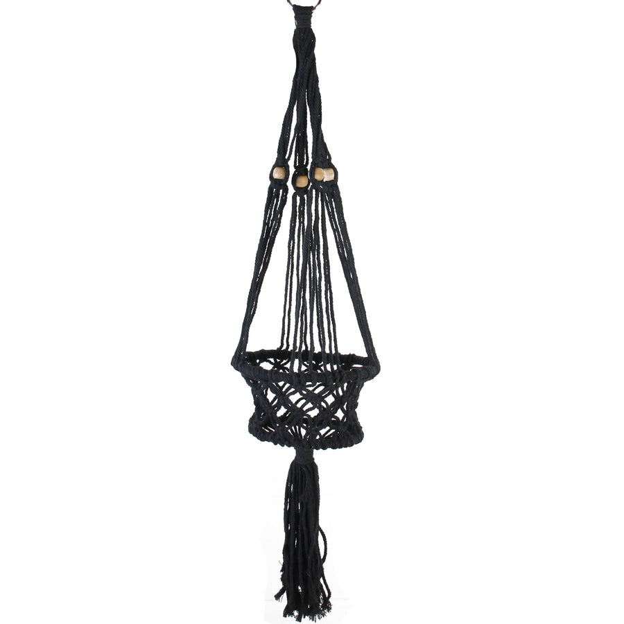 Black macramé hanging planter with tassel and wooden beads on white background, full-length view