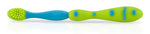 Close-up of a blue-and-green baby toothbrush handle with textured green grip dots and Nuby logo on the end