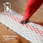 Close-up of O-Cedar mop nozzle spraying liquid onto a textured microfiber pad with 'NO BATTERIES REQUIRED' text