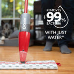 O-Cedar mop spraying water on a microfiber pad on a hardwood floor with copy claiming removal of 99% bacteria