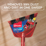 O-Cedar broom and red dustpan photographed on wood floor with packaging label and text claim visible