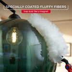 O-Cedar fluffy white refill curving around a glass light globe, highlighting specially coated fibers