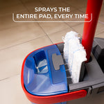 Close-up of O-Cedar mop head over bucket showing the spray mechanism wetting a microfiber pad