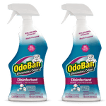 Two OdoBan cotton breeze disinfectant spray bottles side-by-side on white background
