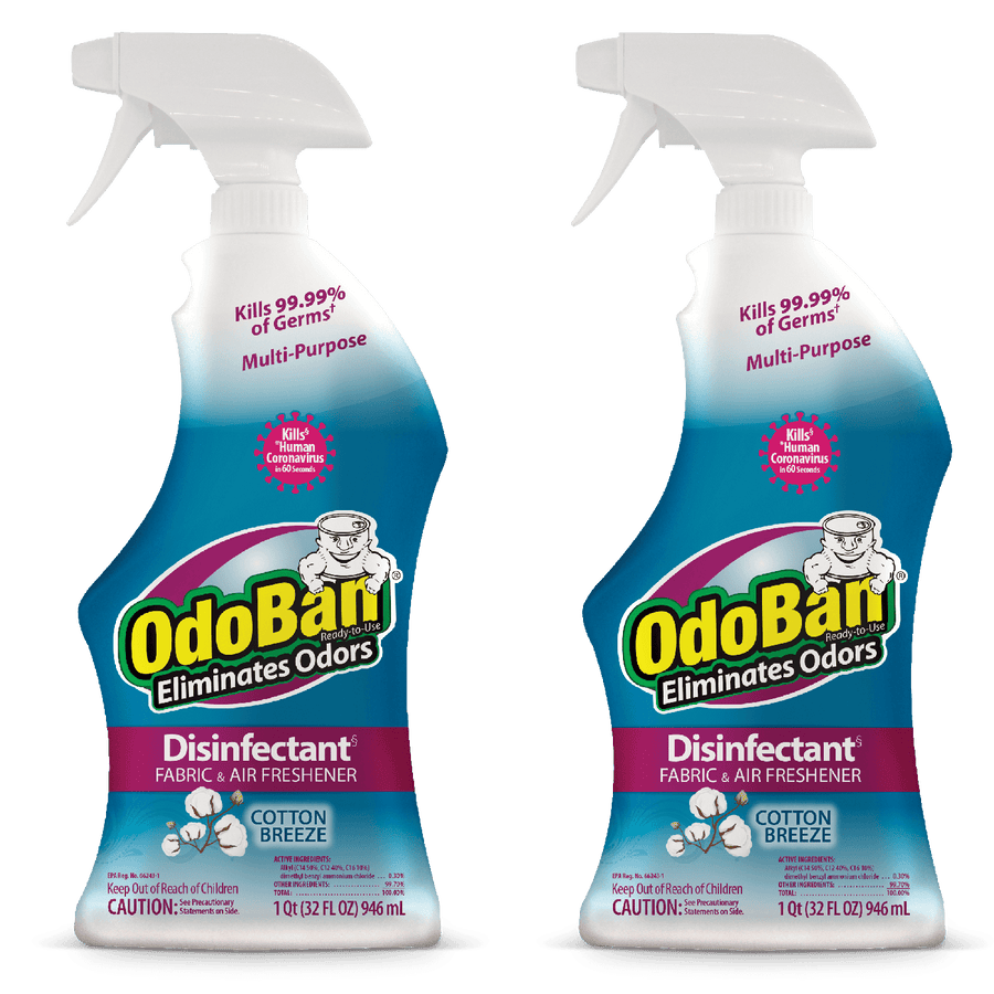 Two OdoBan cotton breeze disinfectant spray bottles side-by-side on white background