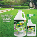 OdoBan Outdoor & Yard gallon refill jug and attached quart hose-end sprayer shown on a manicured lawn background