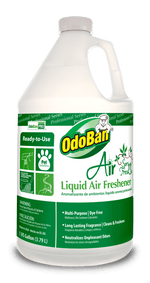 White one-gallon jug of OdoBan Air Liquid Air Freshener with green Spring Fresh label and product branding