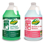 Two one-gallon OdoBan jugs side-by-side: green Neutral pH Floor Cleaner and pink BioStain & Odor Remover labels.