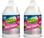 Two one-gallon style jugs of OdoBan No Rinse Neutral pH Floor Cleaner with pink label and citrus imagery