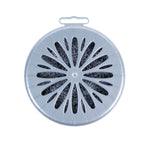 Top view of a round Odor Genie unit showing a silver vented plastic cover and visible odor beads inside