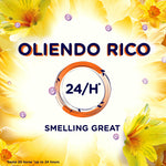 Graphic badge reading "OLIENDO RICO" and "24/H" over a bright floral background promoting scent longevity