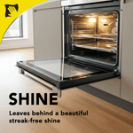 Open oven with door lowered showing clean, shiny interior and text claim about leaving a streak-free shine