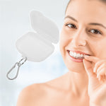 Open white retainer/braces storage case shown next to smiling person holding a clear dental aligner