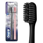 Oral‑B Brilliance extra soft toothbrush blister pack shown beside a closeup of the black toothbrush head and bristles