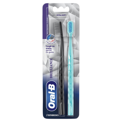 Single blister pack of Oral-B Brilliance showing one black and one teal extra soft toothbrush in retail packaging.